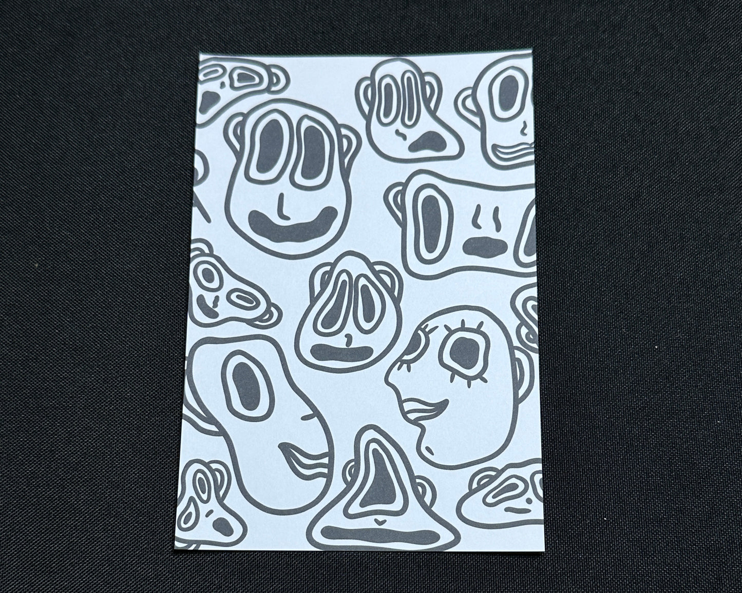 Faces Postcard